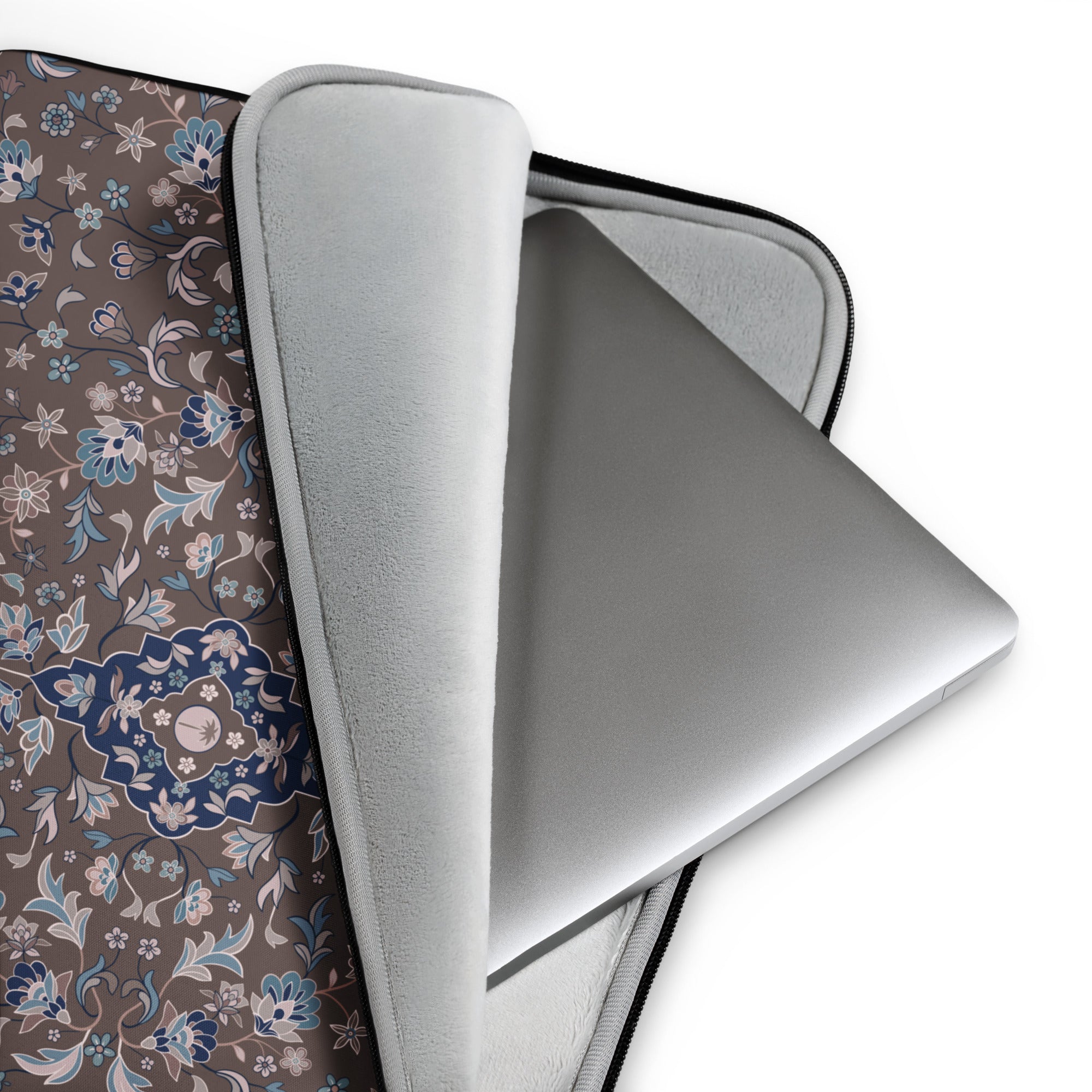 Haramain Brown Laptop Sleeve islamic gift with intricate floral interior and a laptop inside.